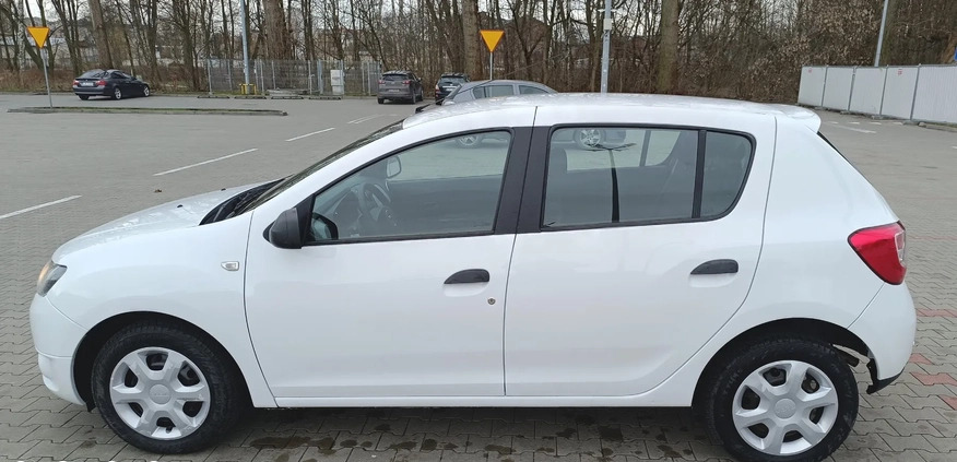 Dacia Sandero cena 23900 przebieg: 140512, rok produkcji 2014 z Ślesin małe 137